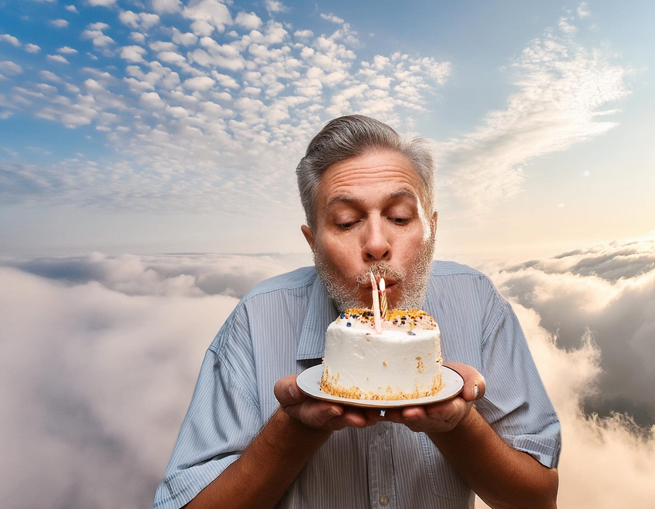 Firefly An old German male gentely blowing a birthday cake in a corner in heaven surrounded by cloud min edited